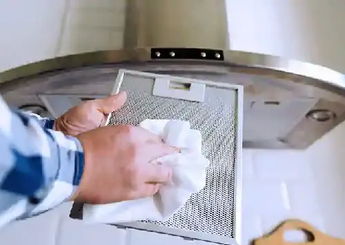 Urban Gas Stove technician servicing a gas stove